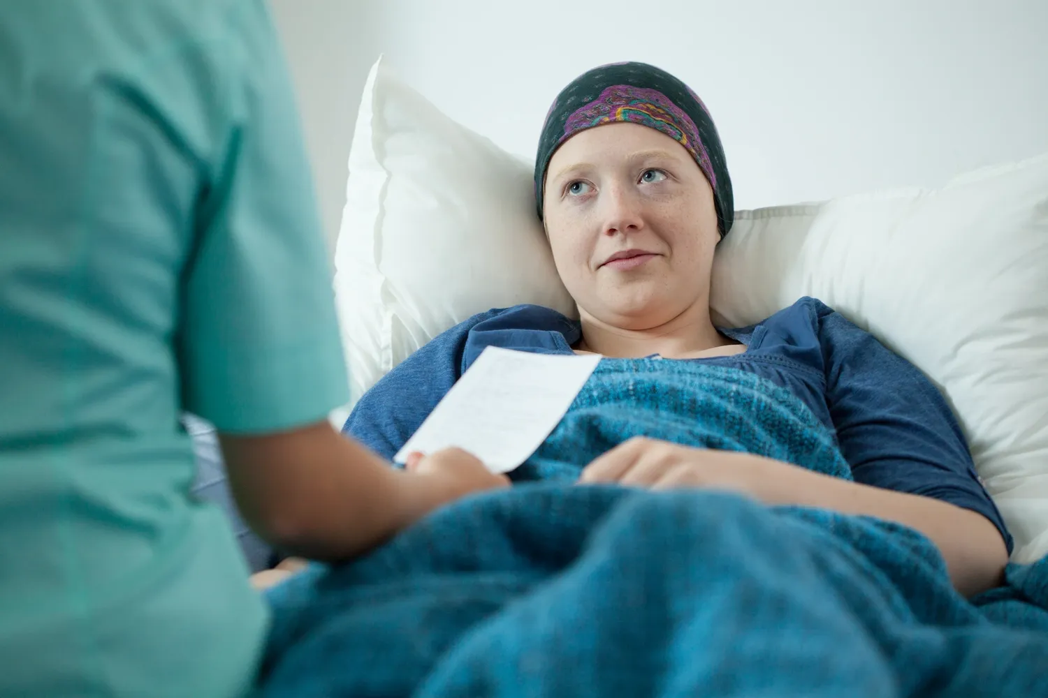 Compassionate caregiver assisting a patient at home